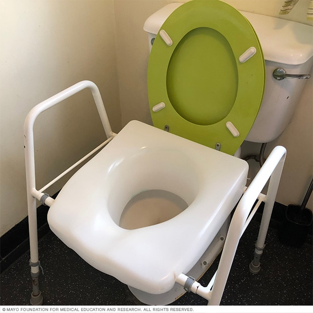 Elevador de asiento para el inodoro
