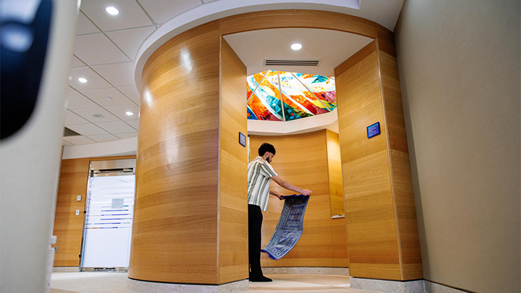 Person using the reflection and prayer room at Mayo Clinic.