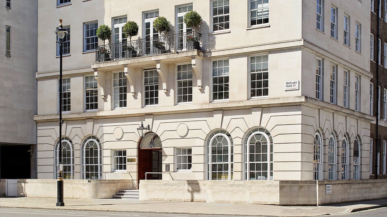 Mayo Clinic Healthcare in London office exterior on a sunny day.