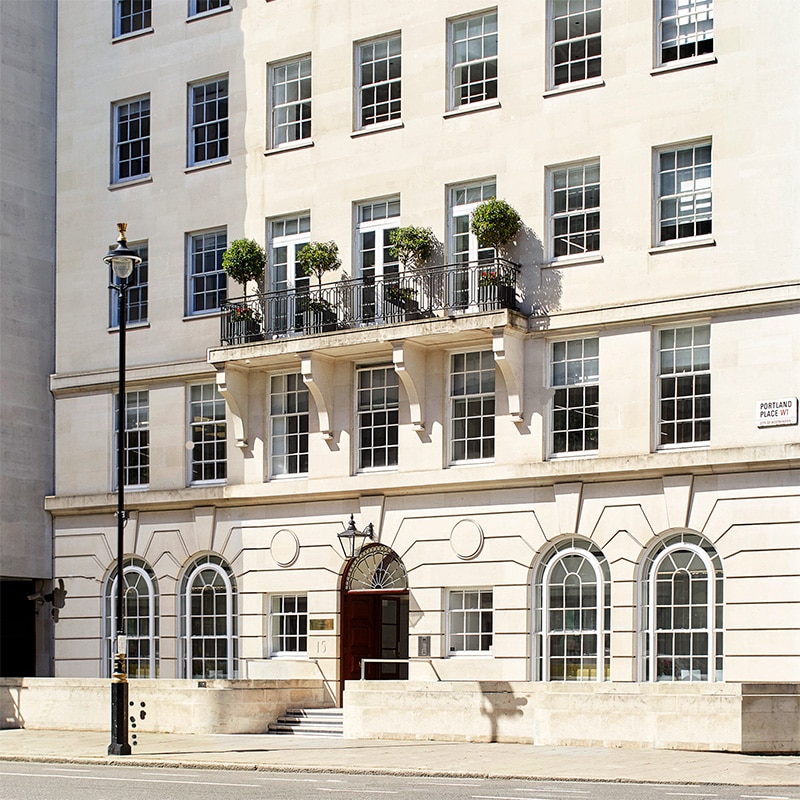 Mayo Clinic Healthcare in London office exterior on a sunny day.